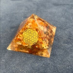 Different Crystal Pyramids with Gold Symbols
